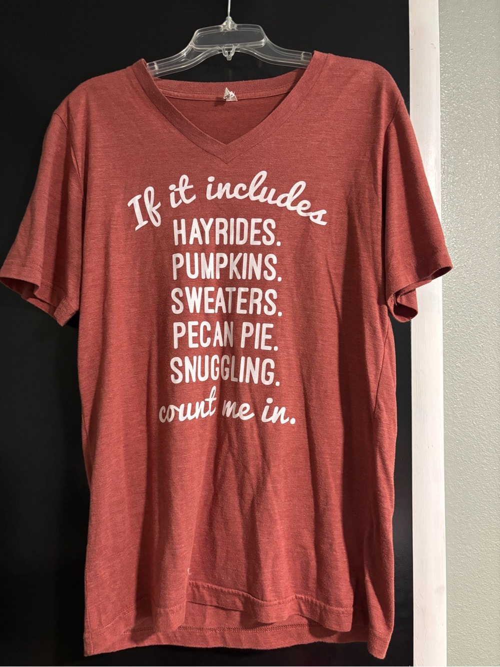 Rubbish Rust Red V-Neck Graphic Tee with White Text